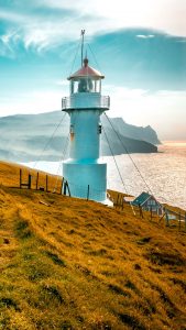 Lighthouse On A Cliff At Mykines Island Faroe Islands Denmark