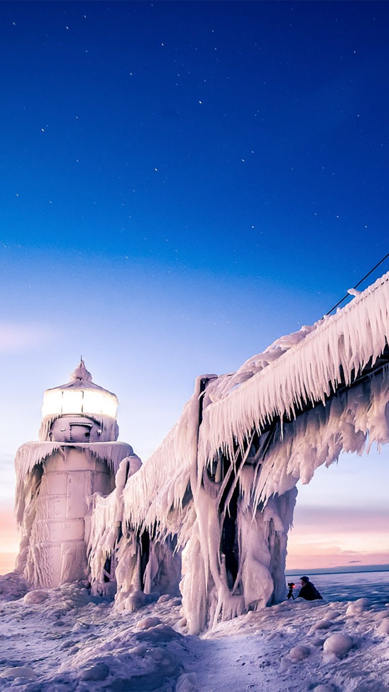 Ice Covered St. Joseph North Pier Lighthouse In Winter, Michigan, USA ...