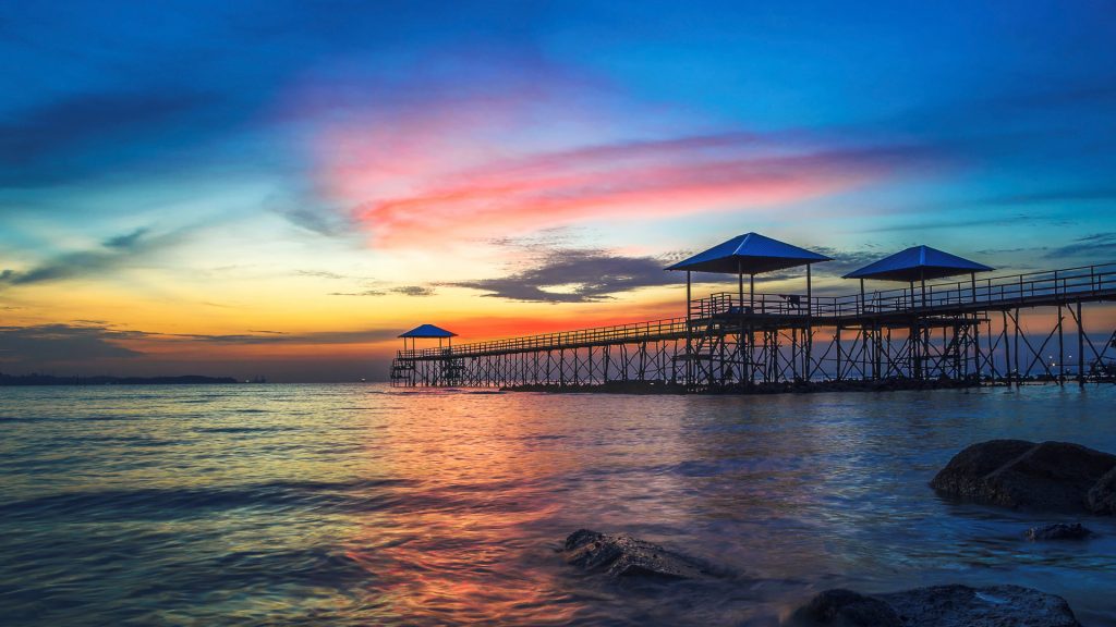 Sunset over jetty, Nongsa Beach, Montigo Resorts, Batam, Riau Islands, Indonesia