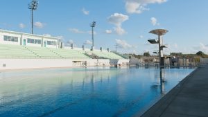 Open air swimming pool with diving platform 1be624c72ae1479775065f3d87344267