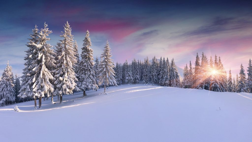 Panorama of the winter sunrise in mountains