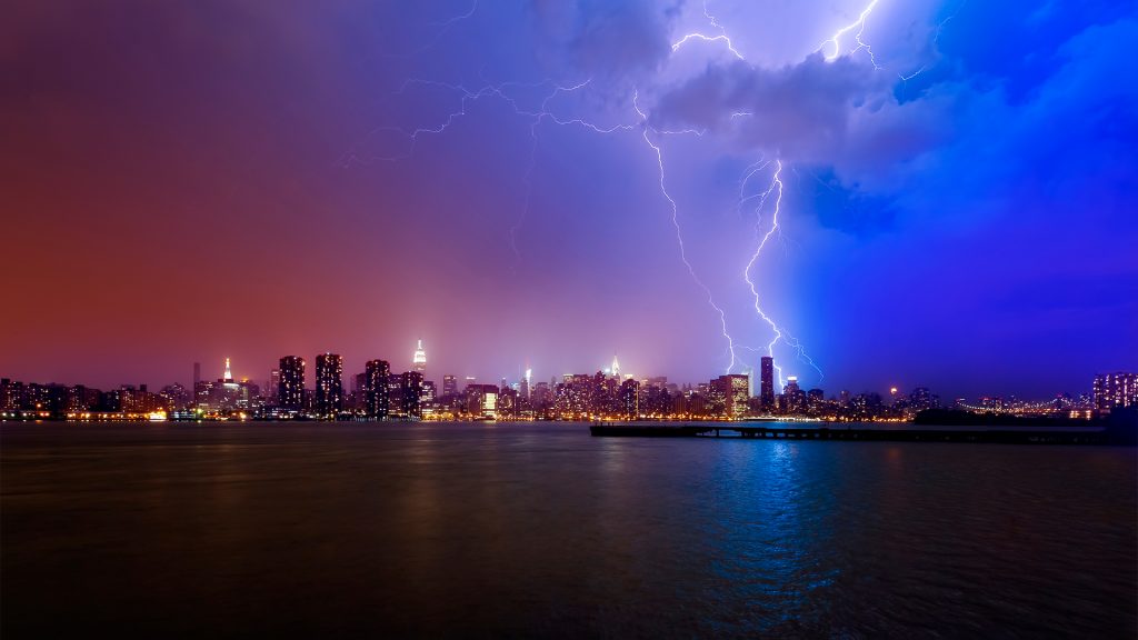 Lightning strike over New York City skyline, USA