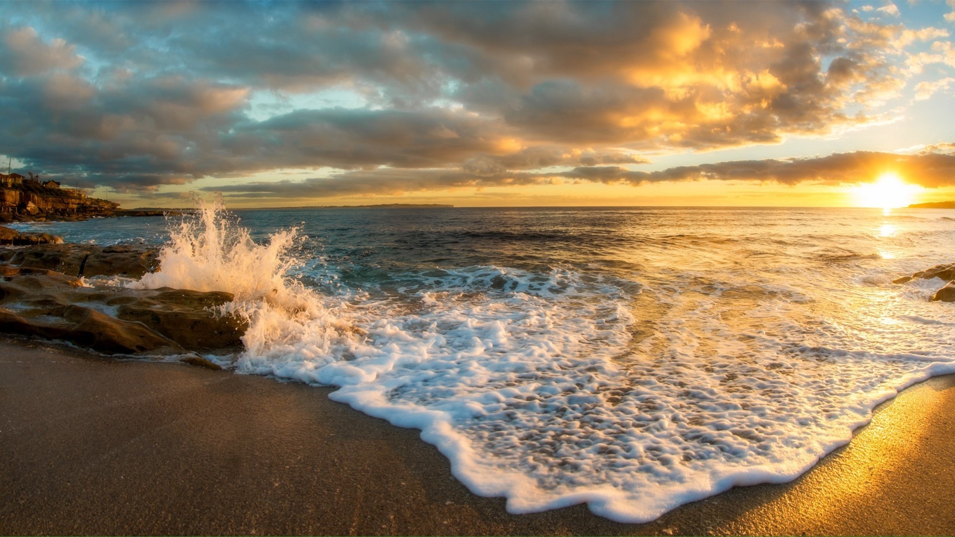 Waves Splashing On Beach Against Cloudy Sky At Sunset Oak Park 