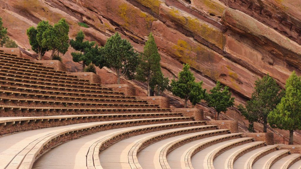 Empty bleacher seats at outdoor Red Rocks Amphitheatre venue, Morrison, Colorado, USA