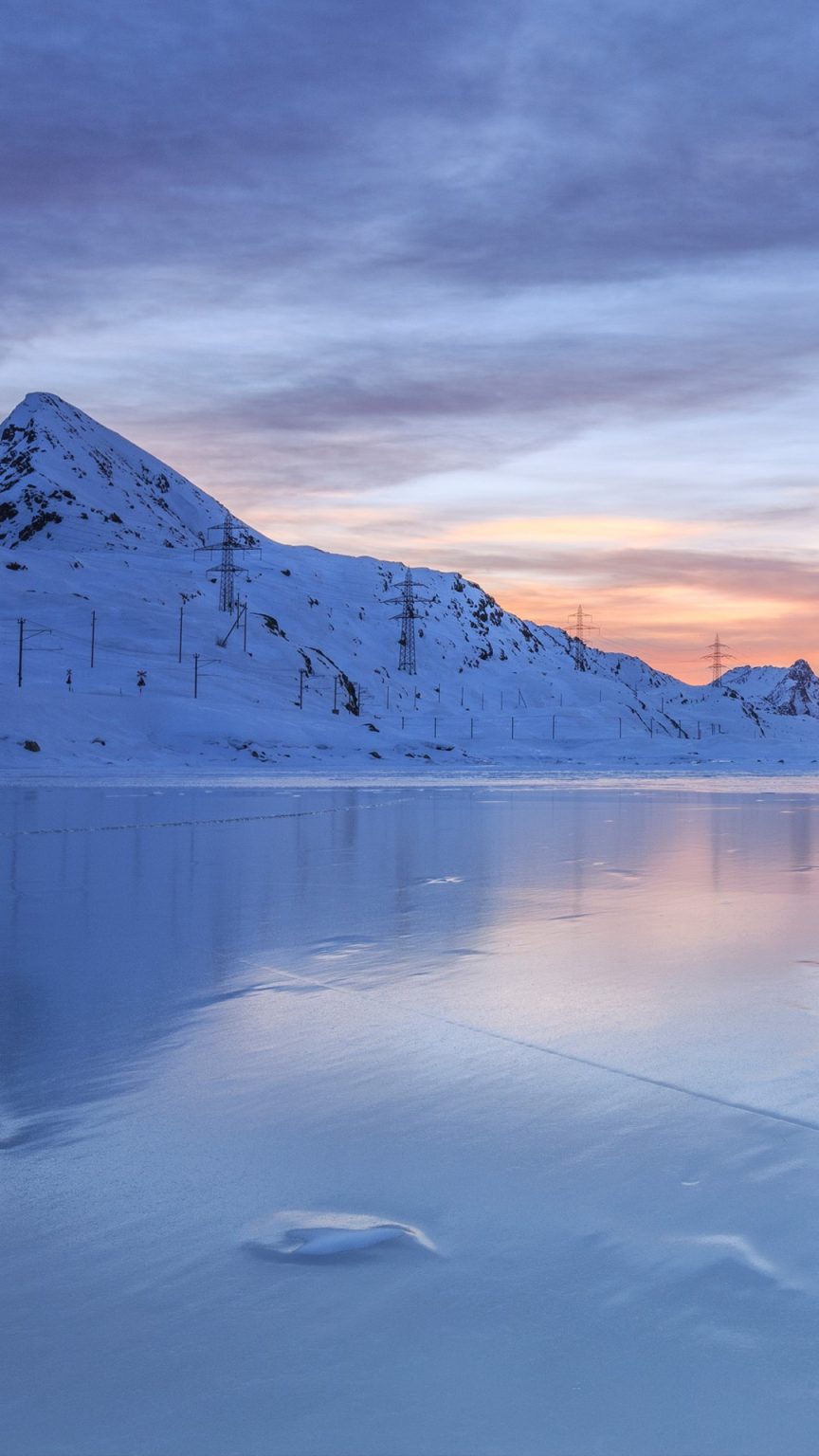 The colors of dawn of Lago Bianco, Bernina Pass, Graubunden, Swiss Alps ...