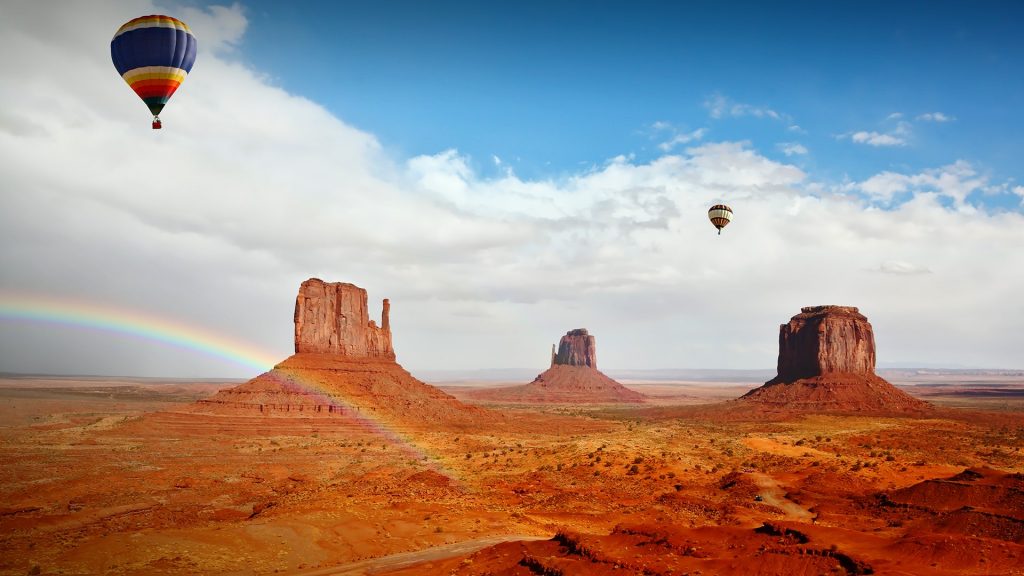 Hot air balloons over Mittens, Monument Valley Navajo Tribal Park, Arizona, USA