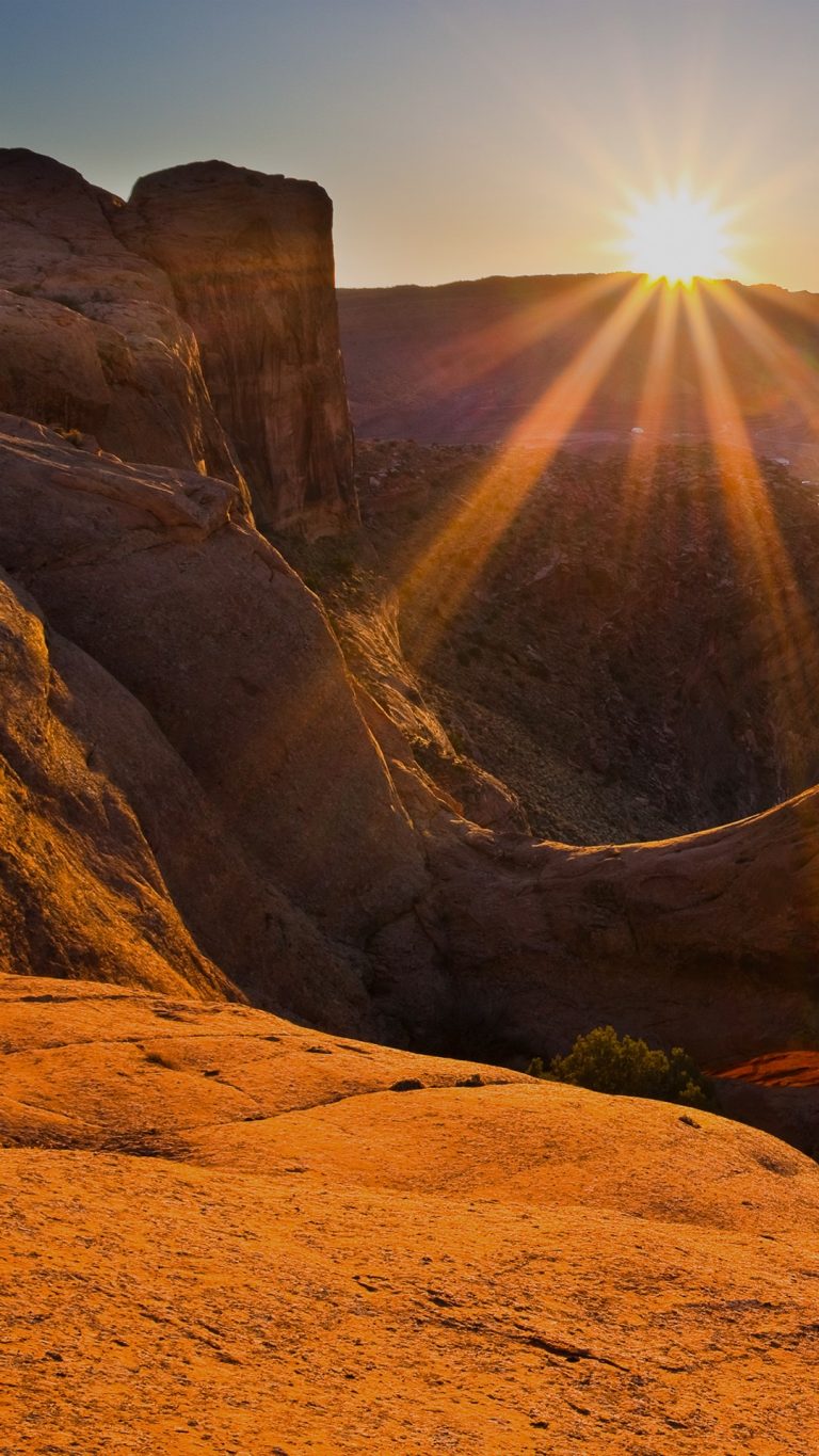 Sun rising over canyon rock formations, Moab, Utah, USA | Windows ...