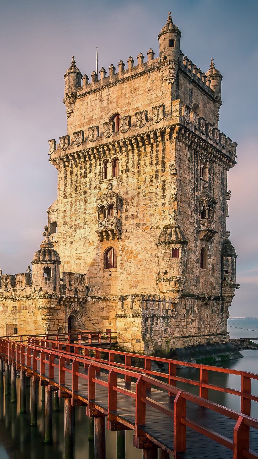 Belém Tower (Torre de Belém) at the Tagus river in Lisbon at sunrise ...