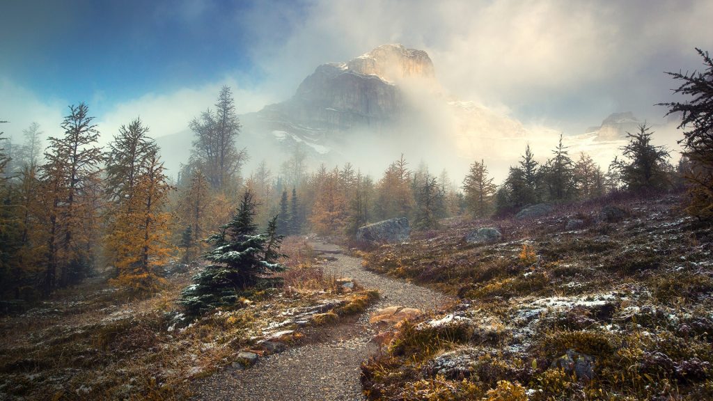 Trail with mountain in mist, Banff National Park, Alberta, Canada