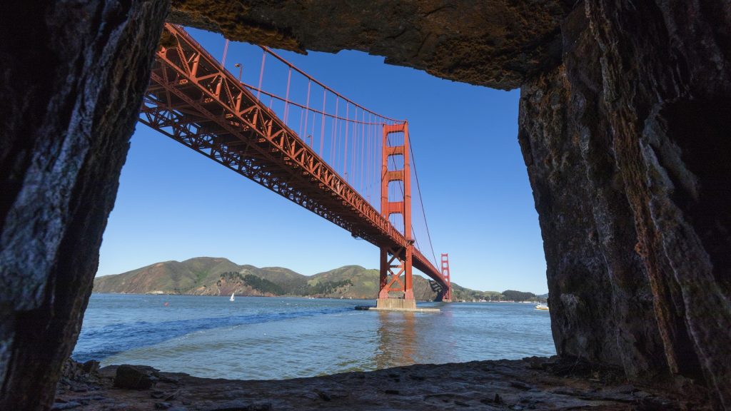 Rocks framing Golden Gate Bridge, San Francisco, California, USA