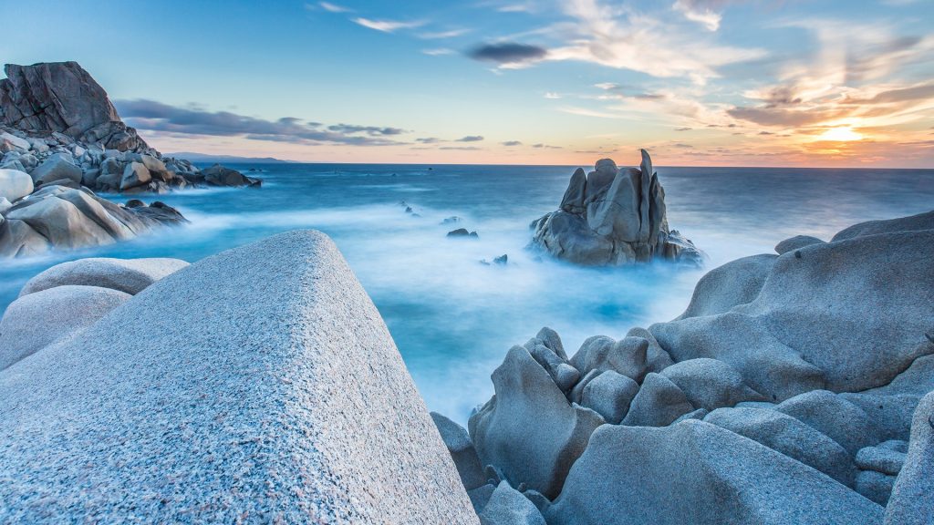 Waves on rocks of Capo Testa Peninsula, Santa Teresa di Gallura, Sardinia, Italy