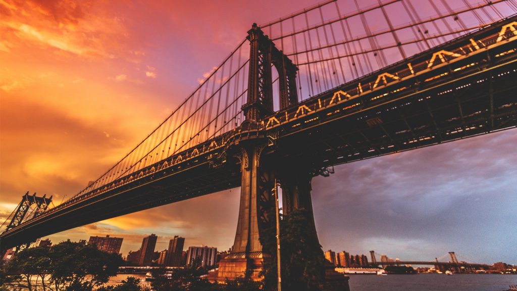 Manhattan Bridge in New York City at dawn retro style, USA