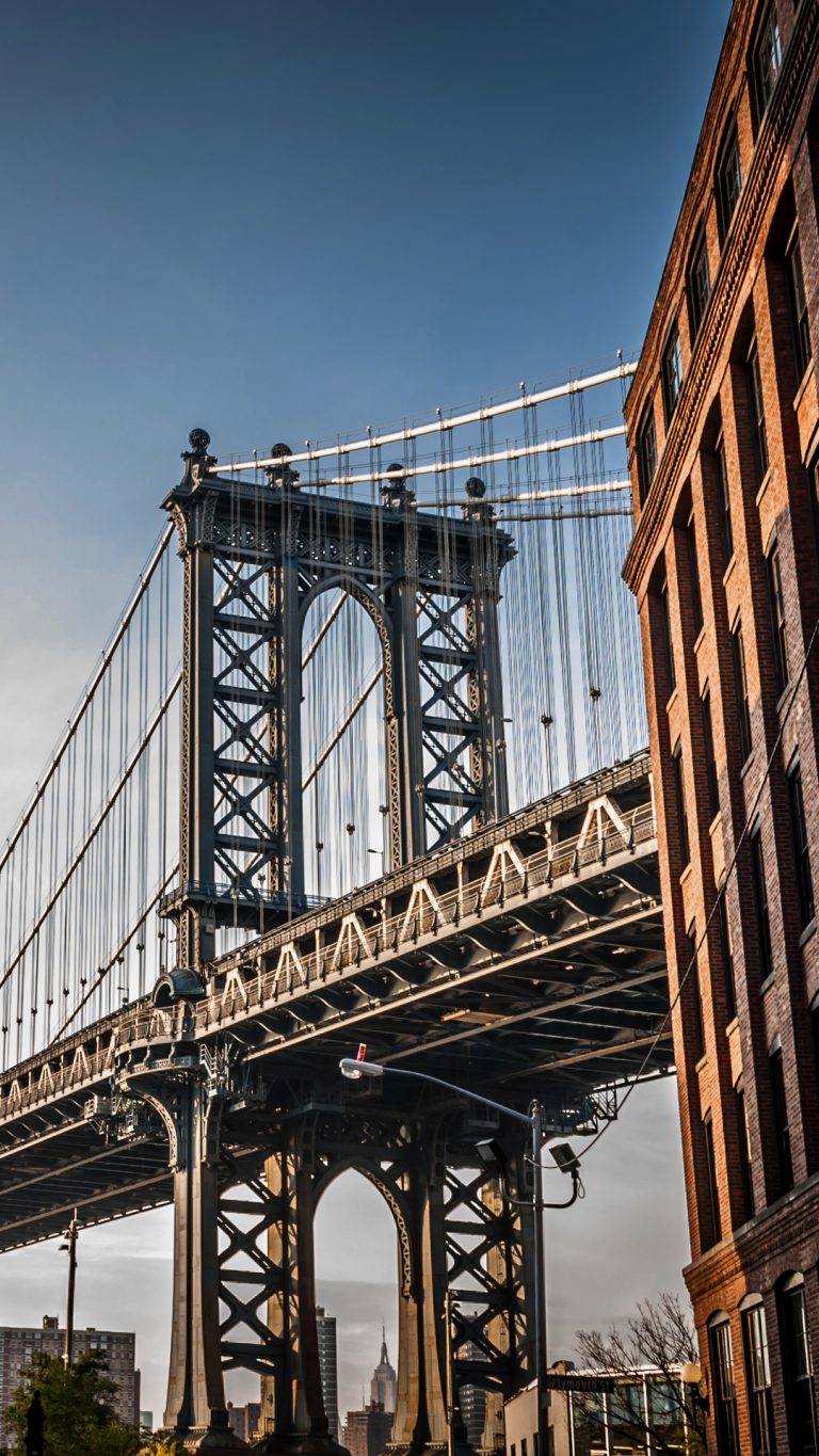 Manhattan bridge view from alley between two buildings, Brooklyn, New York City, USA Windows