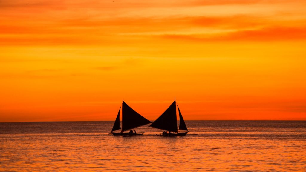 Sailing boats at sunset, Boracay, Philippines