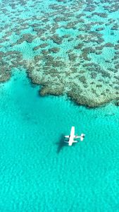 Aerial view of an aircraft at the Great Barrier Reef, Australia ...