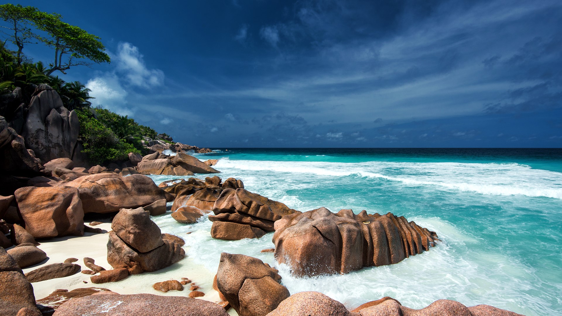 Waves and granite rocks on a paradise beach, La Digue, Seychelles ...
