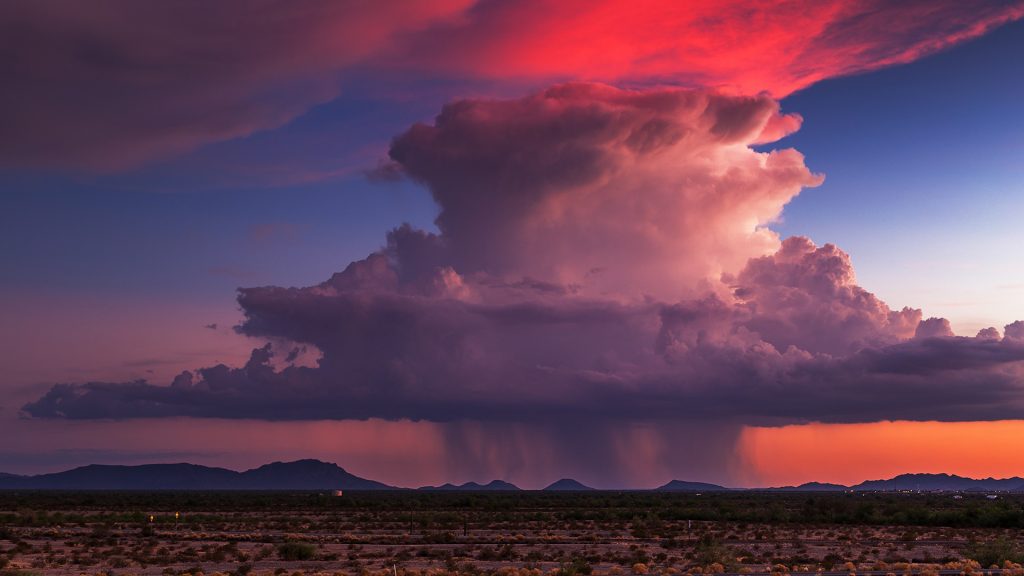 Sunset thunderstorm clouds over desert, Gila Bend, Arizona, USA