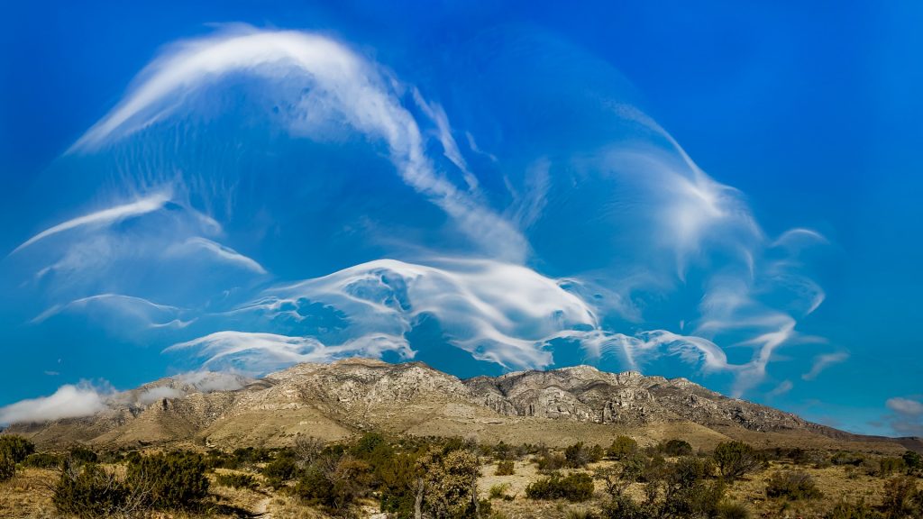 Cirrus clouds over Guadalupe Mountains, Salt Flat, Texas, USA