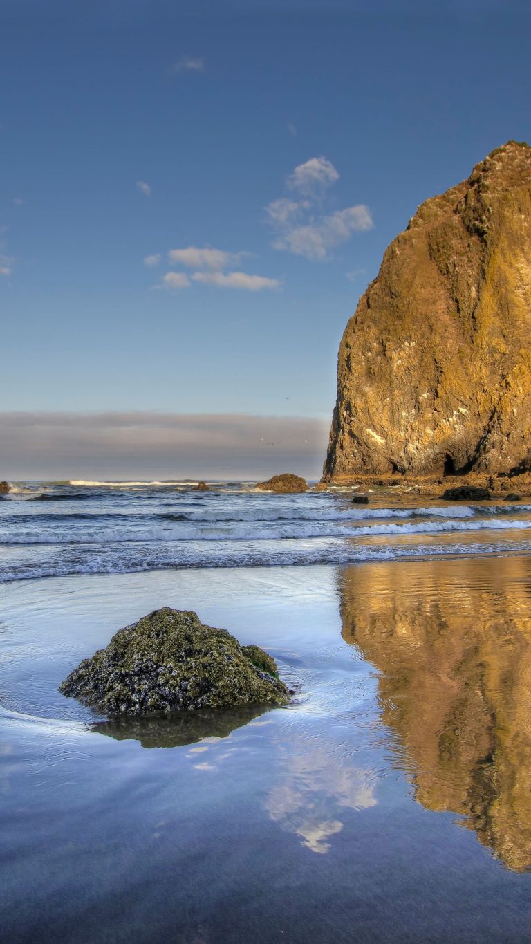 Reflection of Haystack Rock  at Cannon Beach  Oregon USA 