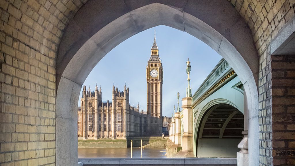 View to Big Ben and Palace of Westminster through a pedestrian tunnel, London, England, UK