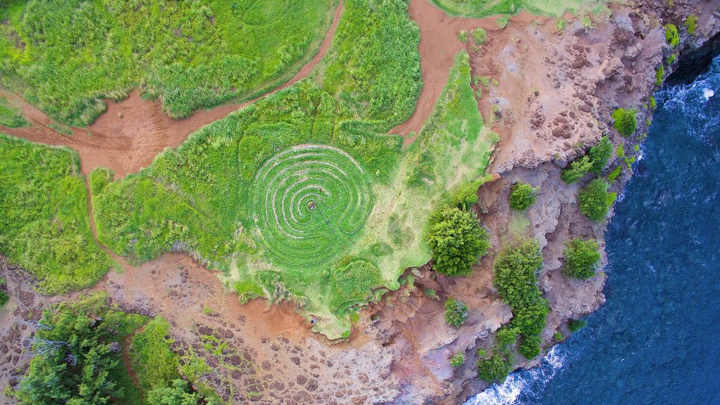 Aerial view of Hawaiian coastline and classical labyrinth, Maui, Hawaii, USA