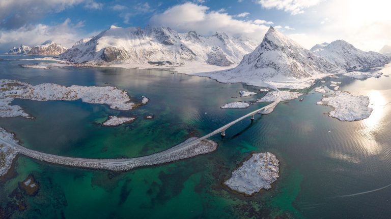 Aerial view of Fredvang bridge and Volanstinden mountain, Flakstad ...