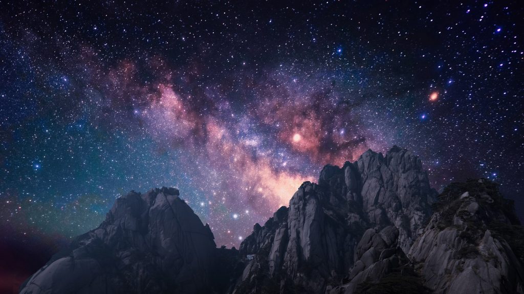 Mount Huangshan against starry sky with Milky Way, Anhui Province, China