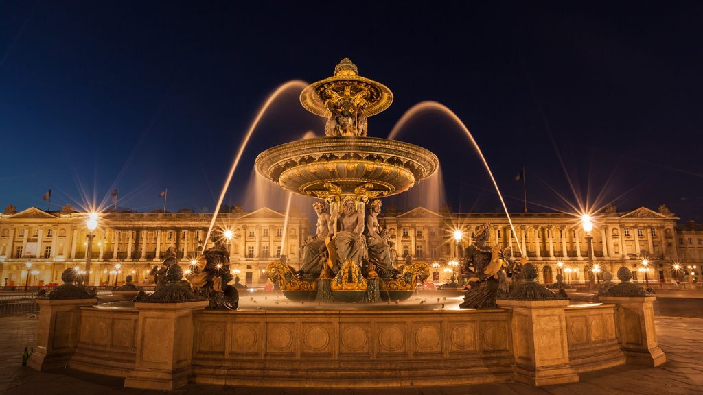 Night view of the fountain at the Place de la Concorde, Paris, France