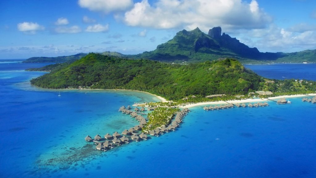 Aerial view of Bora Bora with Mount Otemanu and coral reef, French Polynesia