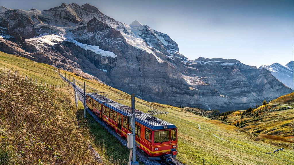 The red train on the Jungfrau railway, Jungfraujoch, Bernese Highlands, Switzerland