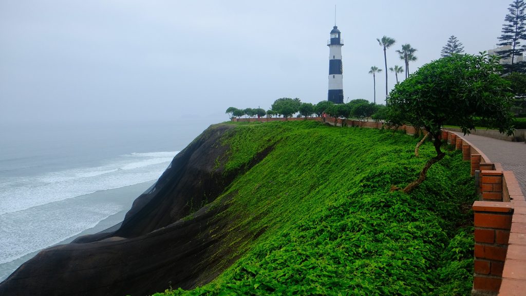 Lighthouse on the coast at the Miraflores Cliffs in Lima, Peru