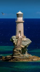 Tourlitis Lighthouse in Chora on Andros island, Cyclades, Greece ...