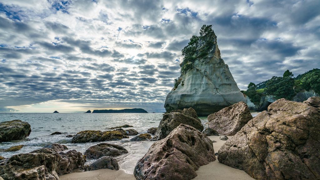 Sandstone rock monolith in Cathedral Cove, Coromandel, New Zealand
