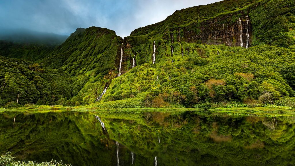 Waterfalls with lake Poço Ribeira do Ferreiro (Alagoinha), Flores Island, Azores, Portugal