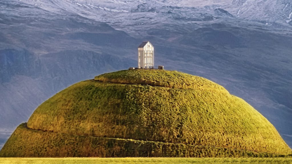 Thufa hill with a fishing shed on top near Reykjavik harbor, Iceland