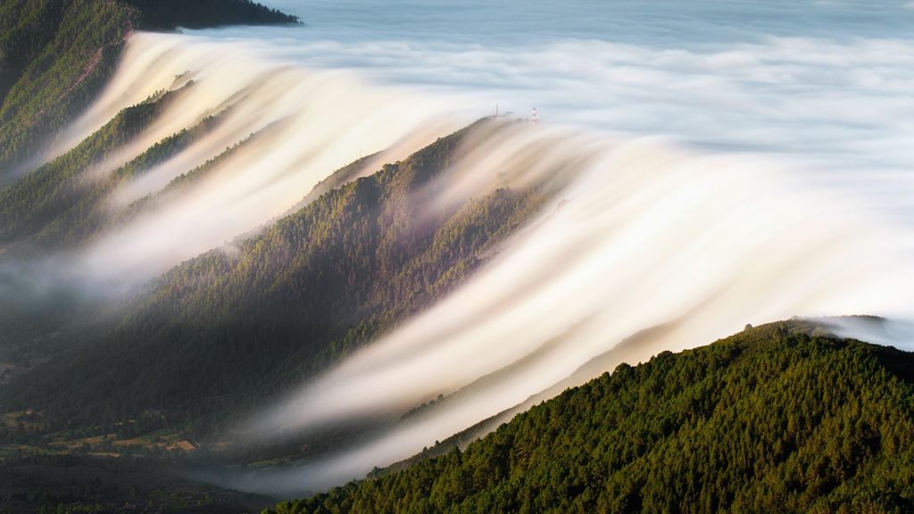 Waterfall of clouds in Cumbre Nueva mountains, La Palma, Canary Islands, Spain