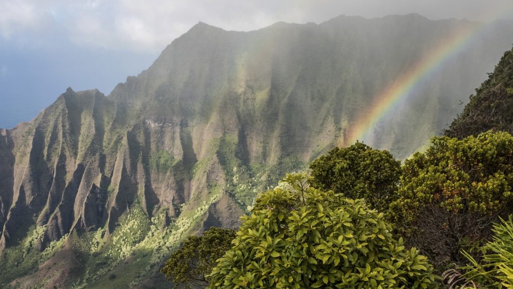 Rainbow over the mountains of the Na Pali Coast on Kauai, Hawaii, USA