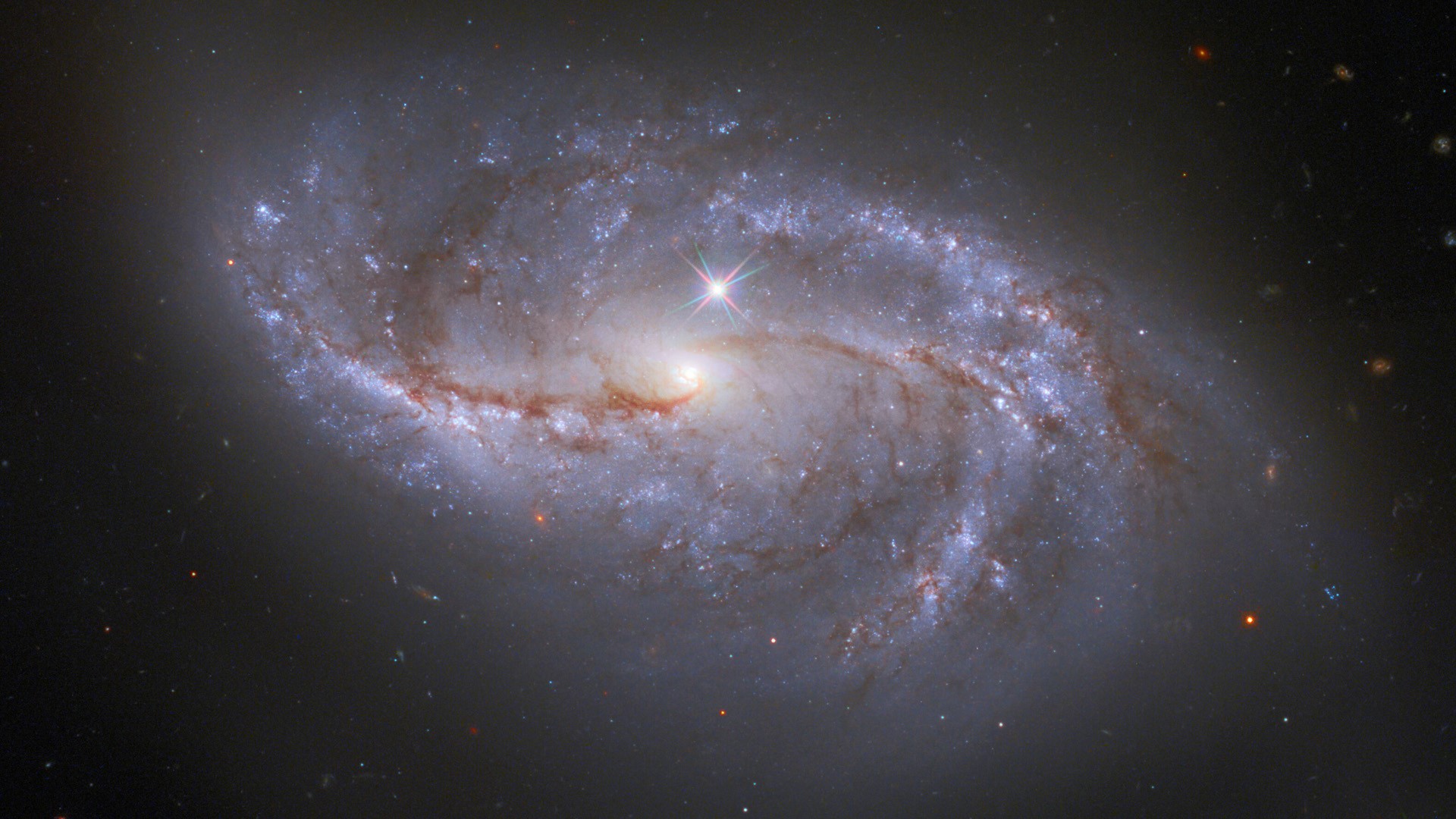 Barred spiral galaxy NGC 2608 in the constellation Cancer | Windows 10 Spotlight Images