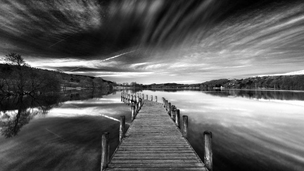 A jetty in Coniston Water at sunrise, Lake District National park, Cumbria, England, UK
