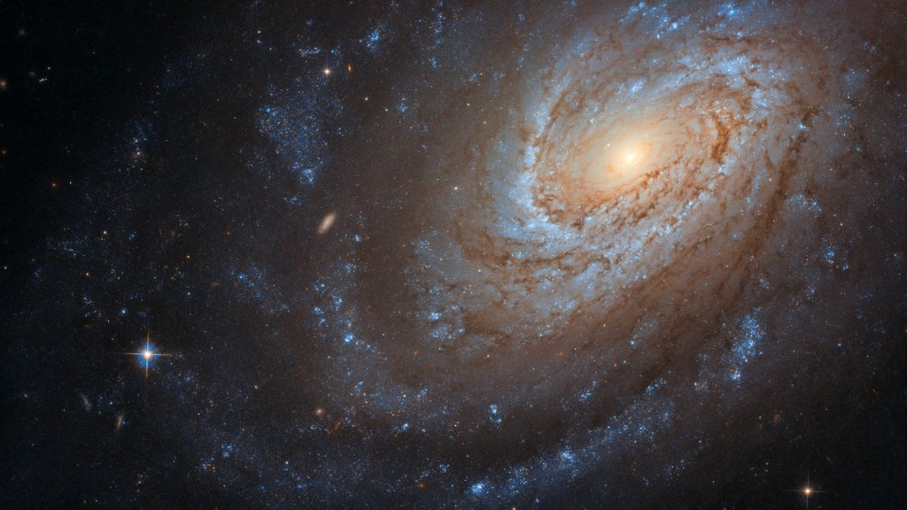 The Umbrella Galaxy NGC 4651 spiral galaxy in the constellation of Coma Berenices
