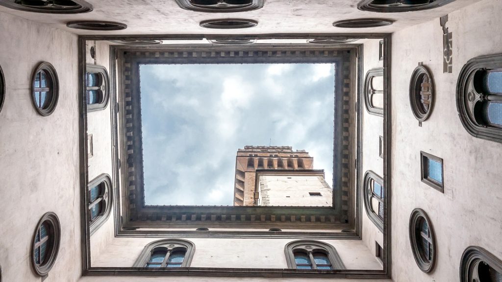 Palazzo Vecchio architecture and geometries view from courtyard, Florence, Italy
