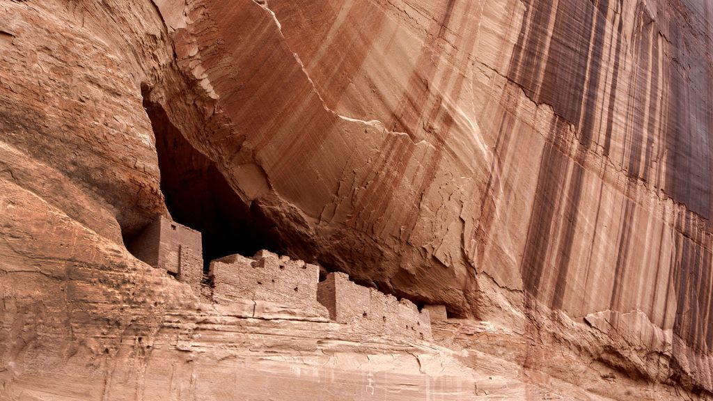 Prehistoric ruins built into a cliff in Canyon de Chelly, Arizona, USA