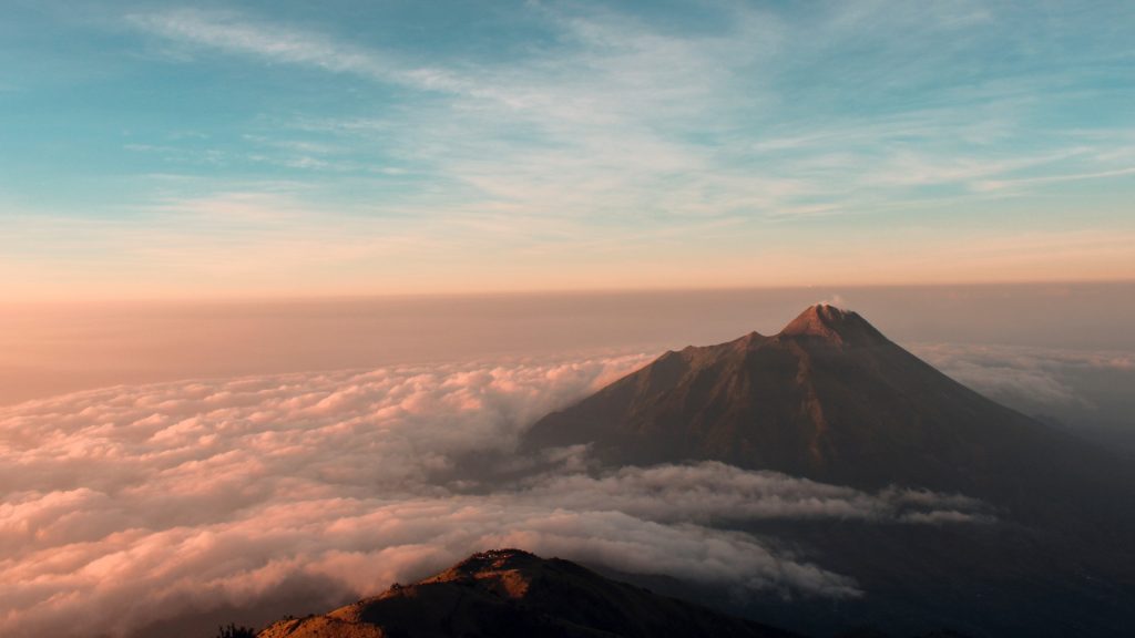 Aerial view of majestic mountains against sky during sunset, Java, Indonesia