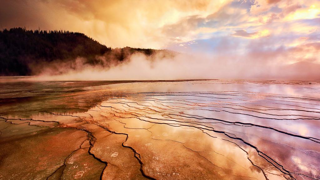 Sunset at the Grand Prismatic Hot Spring in Yellowstone's Midway Geyser Basin, Wyoming, USA