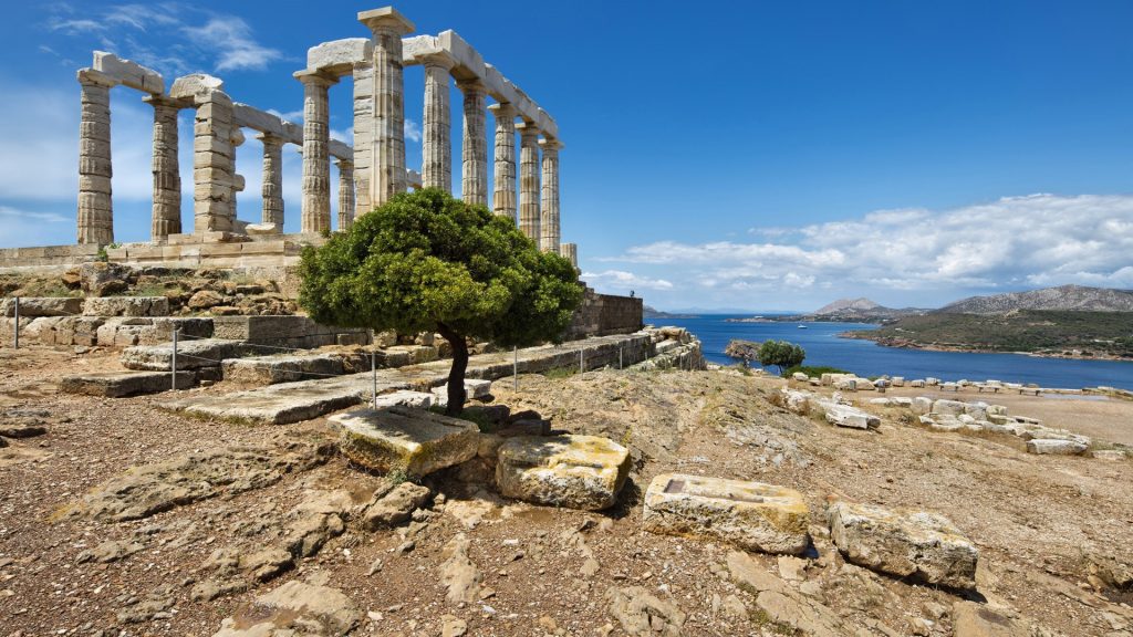 Ancient Temple of Poseidon at Cape Sounion in Aegean sea, Greece