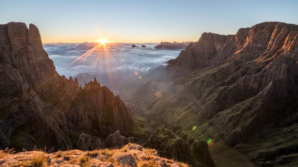 Sunrise in the Drakensberg looking towards Madonna and her Worshippers, South Africa