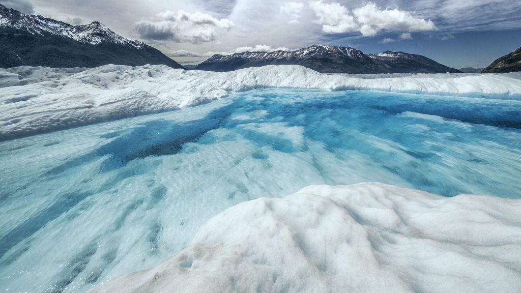 Blue ice lagoon on the Perito Moreno icefield, Lago Argentino department, Argentina