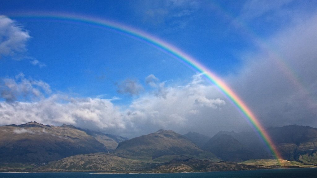 Morning double rainbow over the Lake Wanaka on the South Island of New Zealand