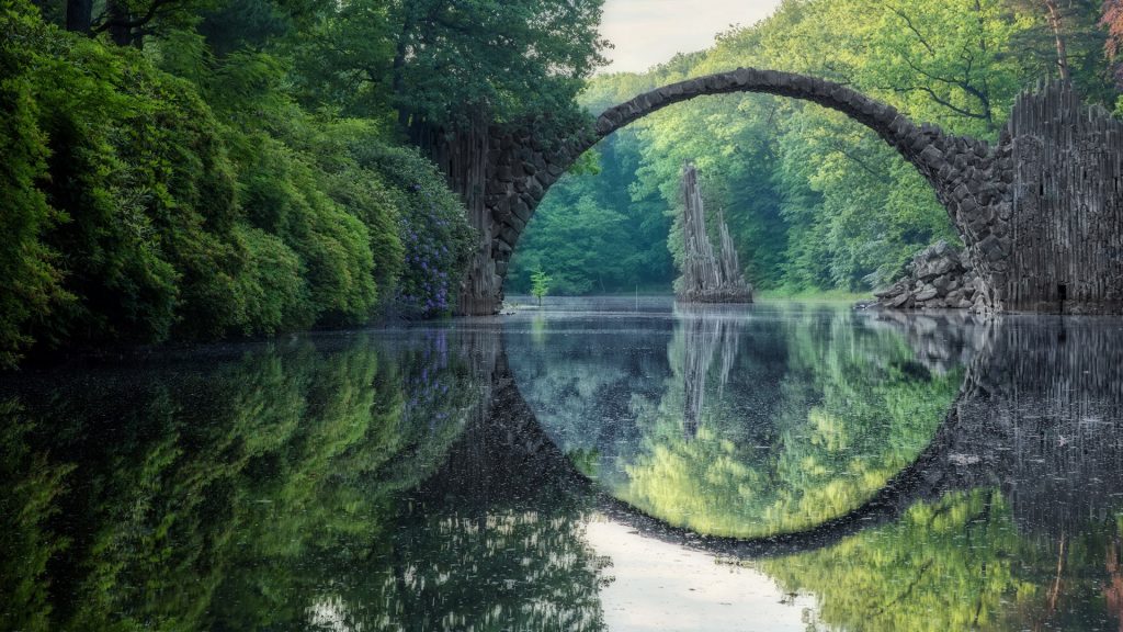 Arched Devil's Bridge (Rakotzbrucke) in summer, Kromlau, Germany