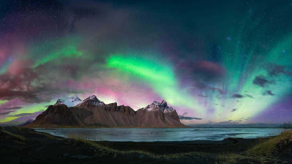 Aurora borealis or northern lights over Stokksnes, Iceland